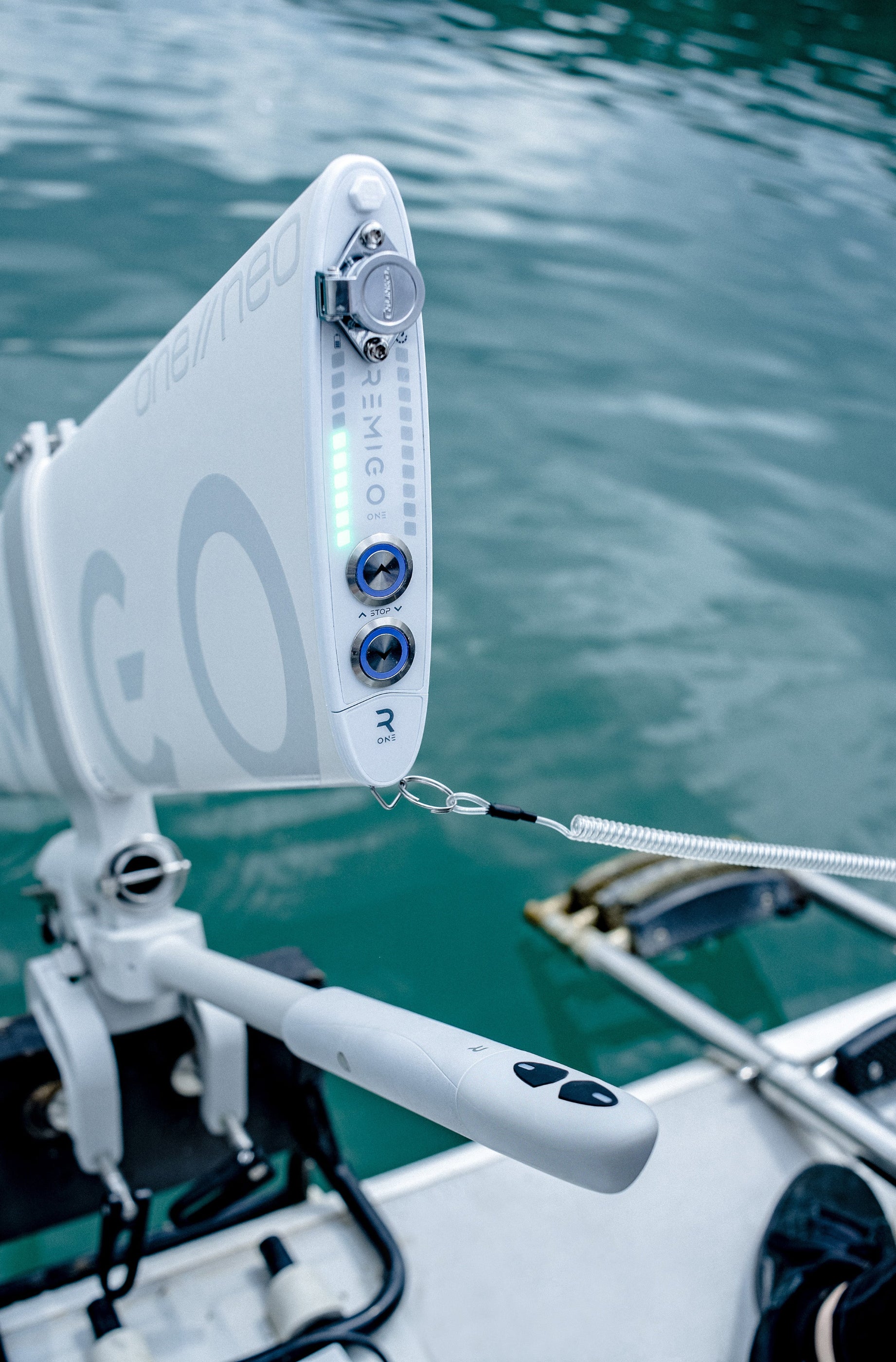 Close-up of a sailboat's rigging with water in the background